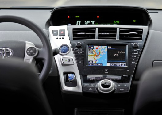A photo of inside a Toyota vehicle with the dashboard infotainment system on display.