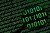 Magnifying glass showing word 'sad sign' in binary code on a computer display
