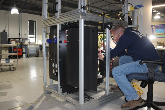 "Advanced Ionics employee completing work on demonstration station which is used for validation and internal testing of our water-vapor electrolyzer cell technology."