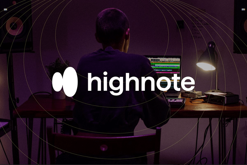 Highnote logo over view from behind of person sitting at laptop