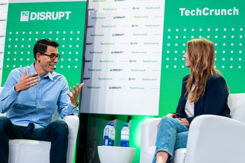 RJ Scaringe, CEO at Rivian and Kirsten Korosec from TechCrunch onstage TechCrunch Disrupt