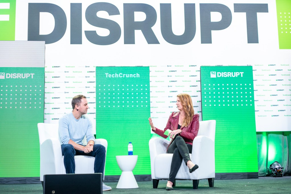 John Zimmer, Co-Founder & President at Lyft talks with Kirsten Korosec about "Steering Towards an Autonomous Future" at TechCrunch Disrupt in San Francisco on October 20, 2022. Image Credit: Haje Kamps / TechCrunch
