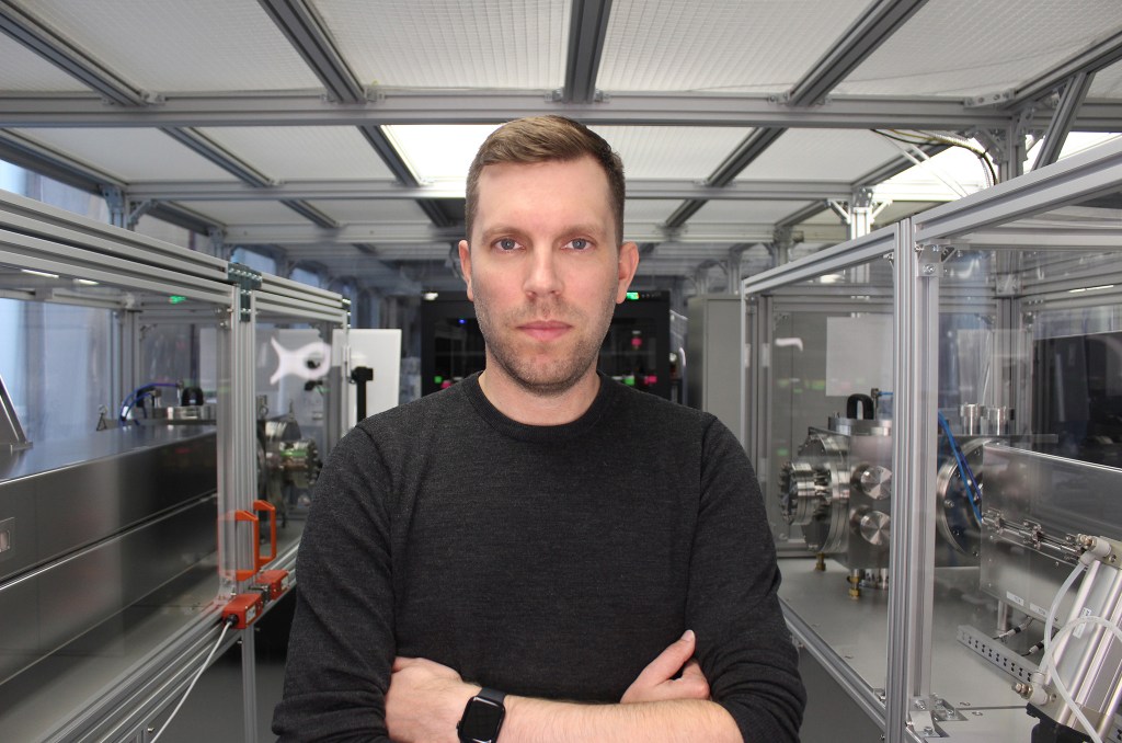 Michael Helander, CEO and president of OTI Lumionics, standing with arms crossed
