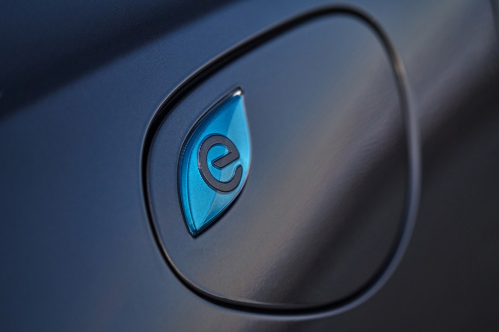 Charging port cover of a Chrysler Pacifica Hybrid