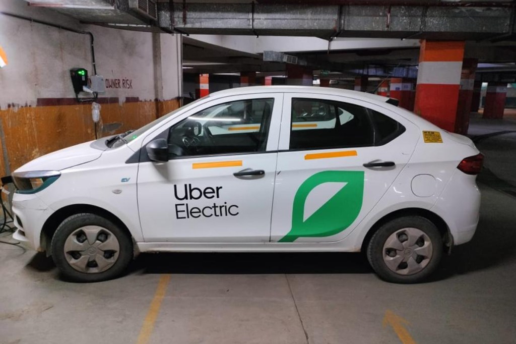 profile view of Uber Electric car