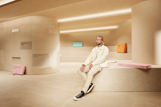 man sitting in office waiting area