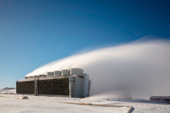 Steam rises off Krafla Geothermal Power Plant in Northern Iceland.