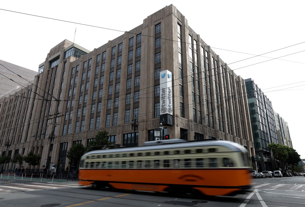 SAN FRANCISCO, CALIFORNIA - OCTOBER 28: A vintage street car passes Twitter headquarters on October 28, 2022 in San Francisco, California. Elon Musk closed the deal to purchase social media platform Twitter for $44 billion and has already fired several top executives. (Photo by Justin Sullivan/Getty Images)