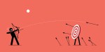 Image of a little cartoon person against a red background trying and largely failing to hit a target with arrows.
