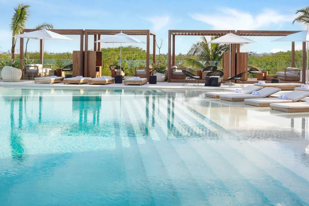 Cabanas beside a large pool