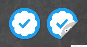 two stickers of Twitter's verified badge, one with a corner flipped up, revealing a $7.99 pricetag
