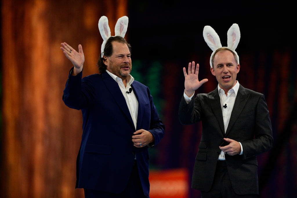Bret Taylor, co-chief executive officer of Salesforce.com Inc., right, and Marc Benioff, co-chief executive officer of Salesforce.com Inc., wear rabbit ears during a keynote at the 2022 Dreamforce conference in San Francisco, California, US, on Tuesday, Sept. 20, 2022. Tens of thousands of techies will frolic through kitschy national park-themed decorations in San Francisco's downtown this week as Salesforce Inc.'s annual Dreamforce conference returns in full after two pandemic years.