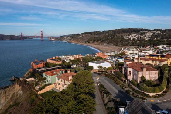 Houses in the Sea Cliff neighborhood of San Francisco, California, US, on Thursday, Dec. 15, 2022. California home sales plunged this year as soaring interest rates held back buyers in the costly state. Photographer: David Paul Morris/Bloomberg via Getty Images