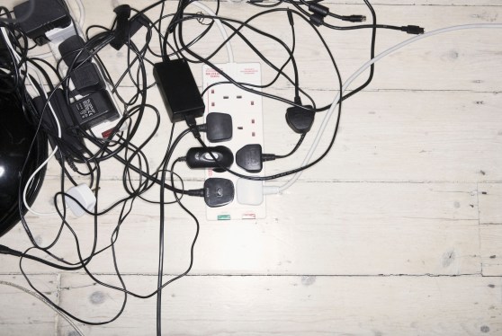 Tangled mess of power leads and chargers