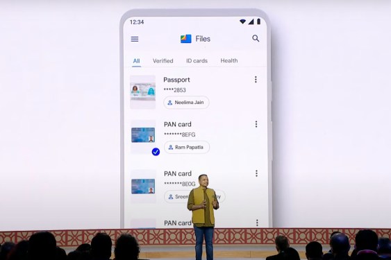 Ggoogle Files integrating DigiLocker displayed on a large screen behind a man talking onstage
