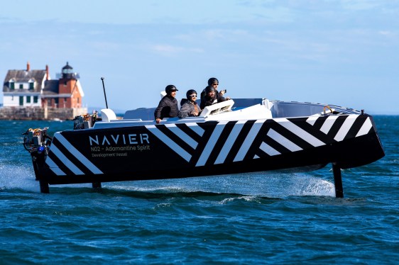 The Navier N30, a hydrofoiling electric boat, on the water.