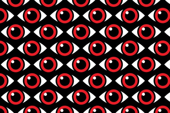 Red eyes with a white glint on a patterned black background.