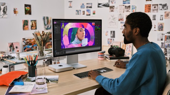 Man sitting at desktop computer