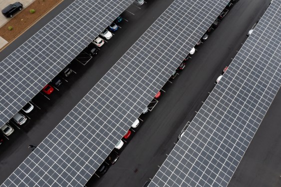 Solar panels cover parked cars at Qcells' Georgia plant.