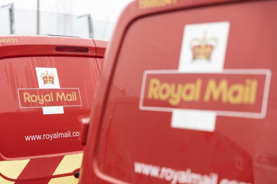 two red vans with the Royal Mail logo on each