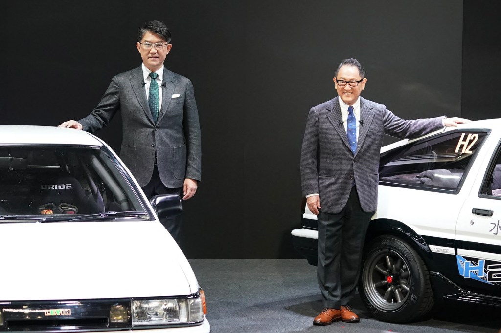 Koji Sato and Akio Toyoda pose at the Tokyo Auto Salon.