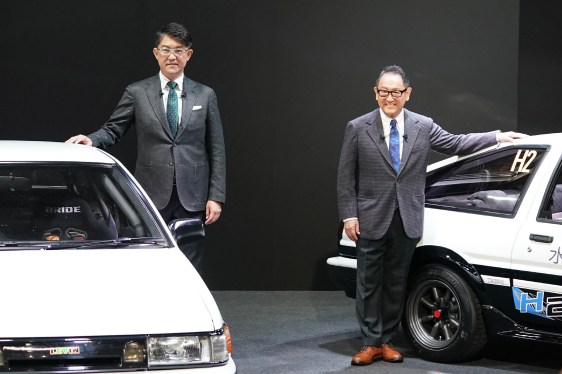 Koji Sato and Akio Toyoda pose at the Tokyo Auto Salon.