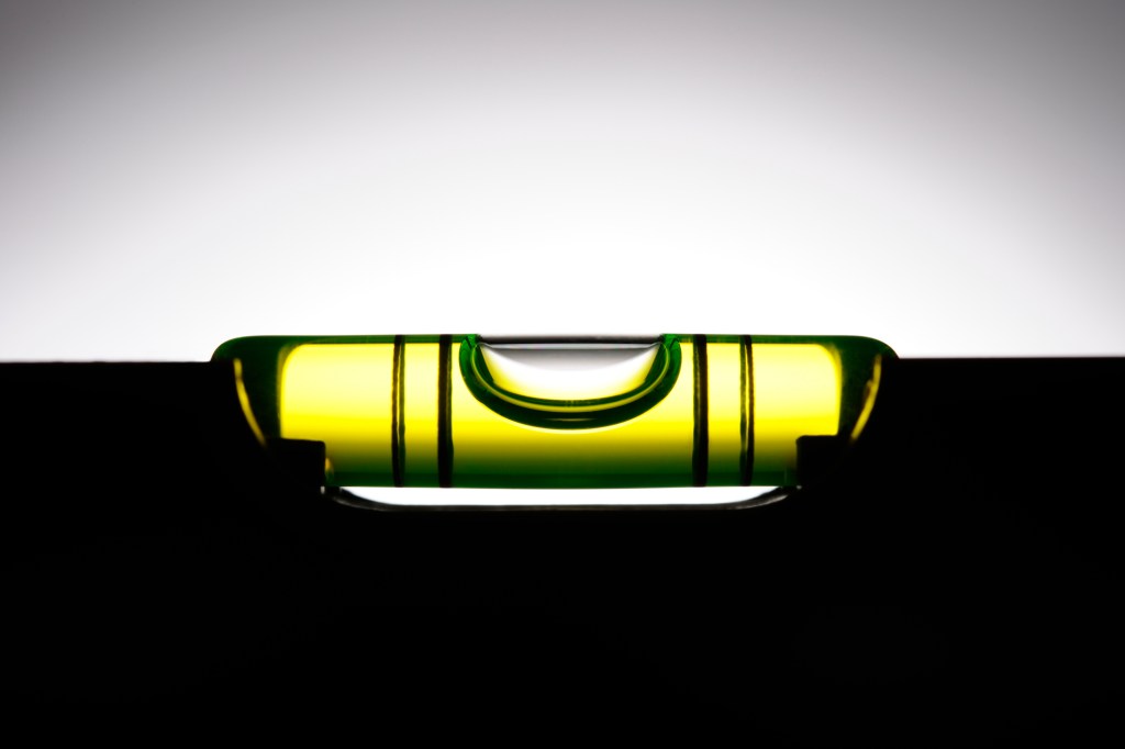 Silhouette of level against white background