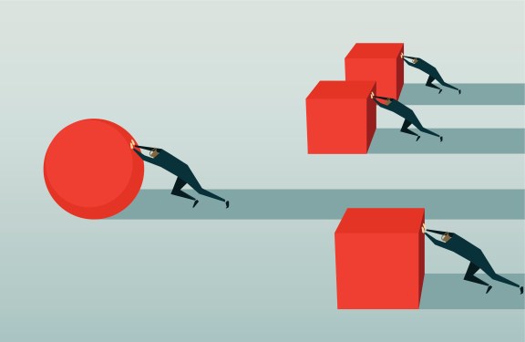 Image of four businessmen pushing red shapes, three blocks and one ball.