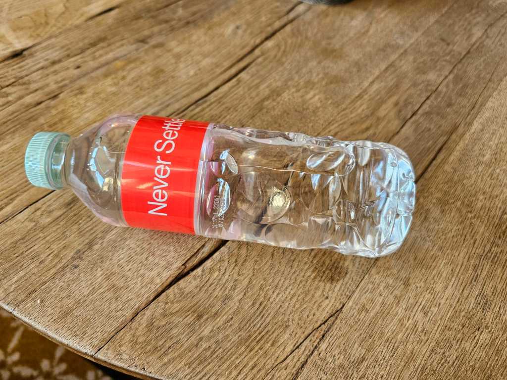 plastic water bottle on its side