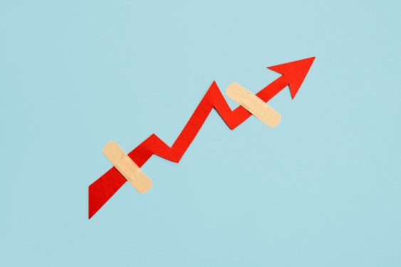 secondaries market illustrated with a red up arrow with two bandaids