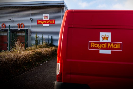 a Royal Mail van in front of a Royal Mail depot in Devon, UK