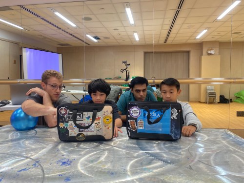 Strive founders Tamir Shklaz and Pulkit Agarwal teaching kids how to code