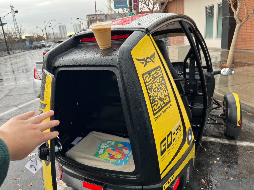 Arcimoto FUV's teeny storage compartment (aka a trunk).