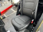 Arcimoto's FUV, with a wet seat from the rain.