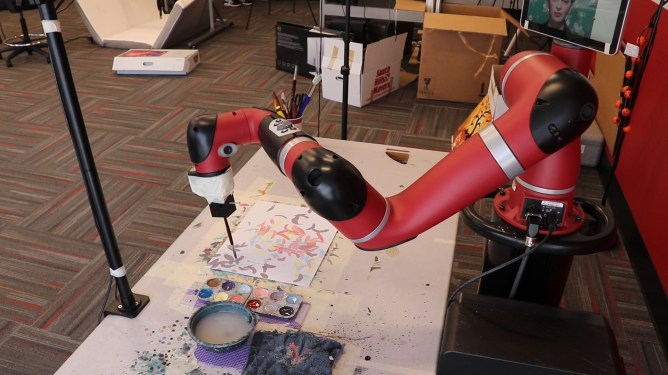 robotic arm in action, painting