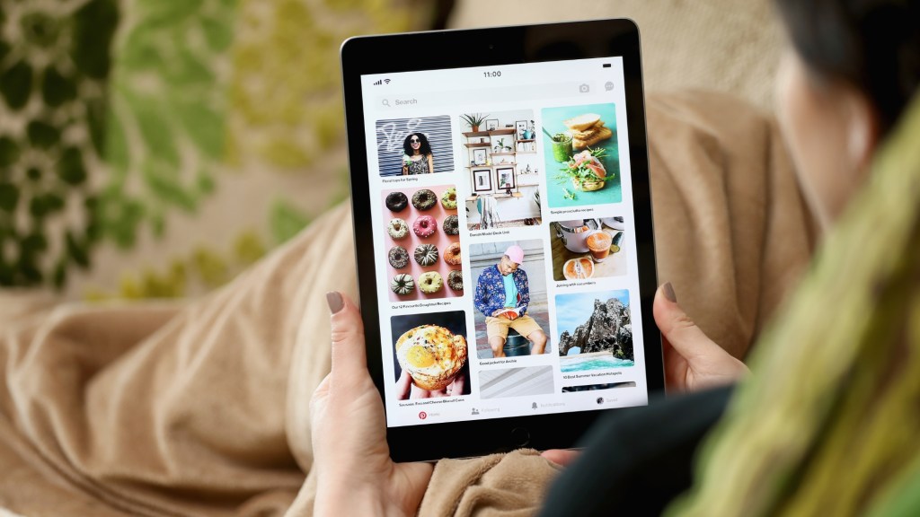 Person looking at Pinterest on a tablet