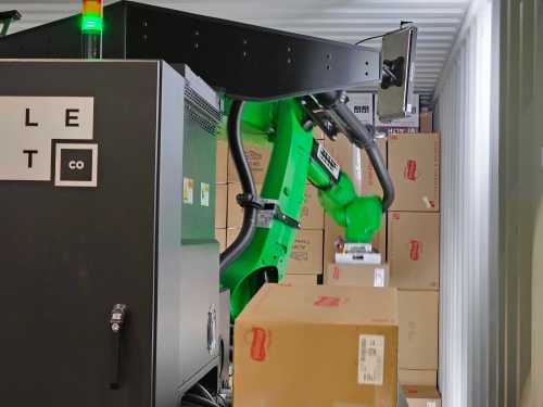 Pickle's truck unloading robot arm