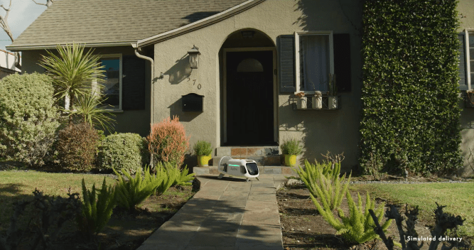 Zipline delivery drone droid in front of a house