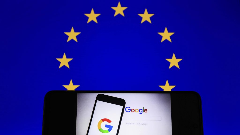 Google logo and Flag of Europe are displayed on screens