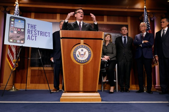 Senate Select Committee on Intelligence Chairman Mark Warner (D-VA) talks to reporters while introducing the Restrict Act with (L-R) Sen. Joe Manchin (D-WV), Sen. Tammy Baldwin (D-WI), Sen. Michael Bennett (D-CO), Sen. Jerry Moran (R-KS) and Sen. Mitt Romney (R-UT) at the U.S. Capitol on March 07, 2023 in Washington, DC. In reaction to software built in countries hostile to the United States, including China's TikTok, the new legislation would allow the Commerce Department to take action on suspected foreign spying risks in artificial intelligence, fintech, quantum computing and e-commerce.