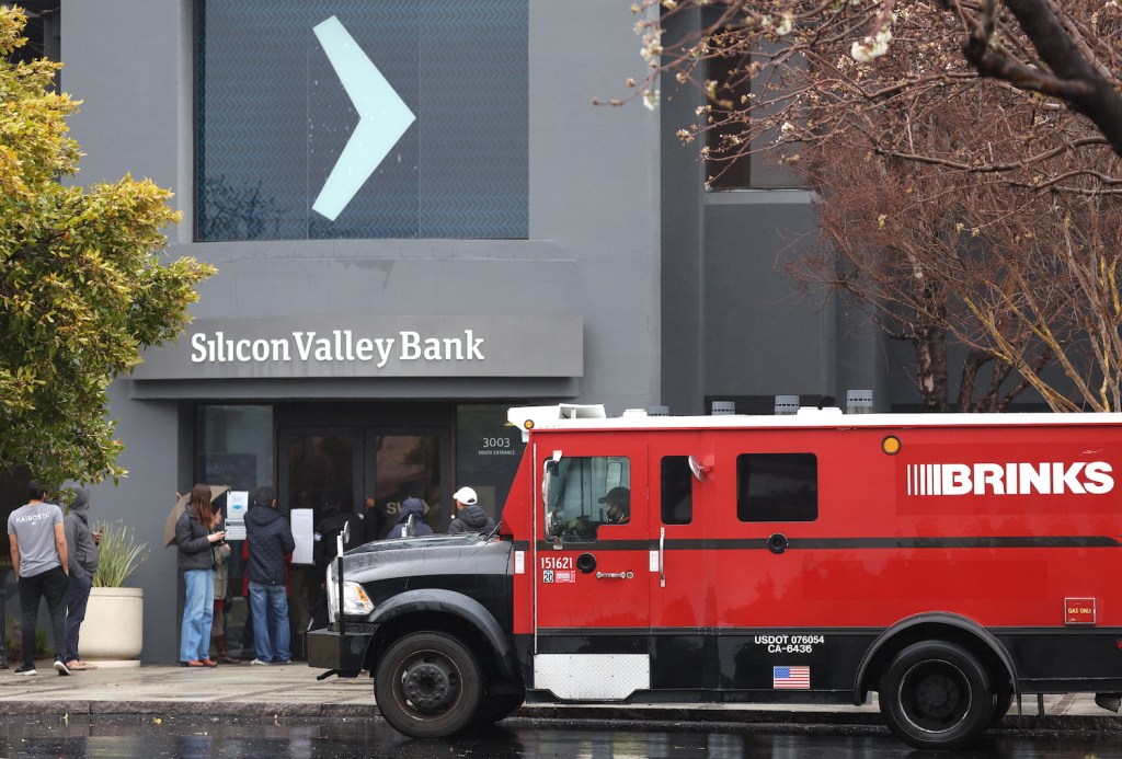 SANTA CLARA, CALIFORNIA - MARCH 10: A Brinks armored truck sits parked in front of the shuttered Silicon Valley Bank (SVB) headquarters on March 10, 2023 in Santa Clara, California. Silicon Valley Bank was shut down on Friday morning by California regulators and was put in control of the U.S. Federal Deposit Insurance Corporation. Prior to being shut down by regulators, shares of SVB were halted Friday morning after falling more than 60% in premarket trading following a 60% declined on Thursday when the bank sold off a portfolio of US Treasuries and $1.75 billion in shares to cover declining customer deposits. (Photo by Justin Sullivan/Getty Images)