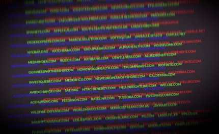 a manipulated photo of the Clop ransomware leaks page, displaying domains targeting by ransomware on a multi-colored blurry text