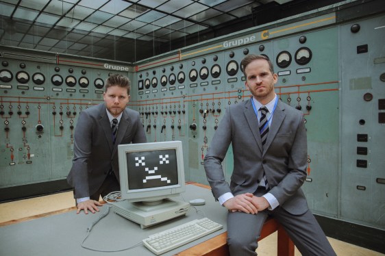 Deeploi PR photo; two men in old-school server room