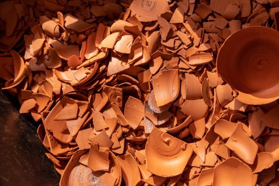 Gaestar's disposable clay cups, smashed in a pile.