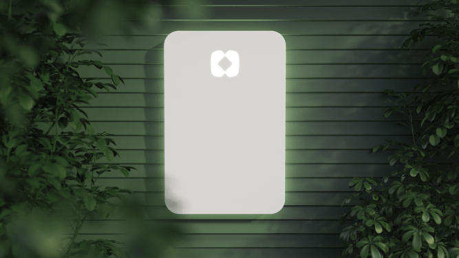 Haven Energy battery hung on the outside of a house.