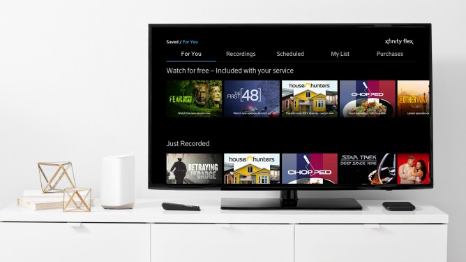 TV on credenza displaying Comcast NOW TV
