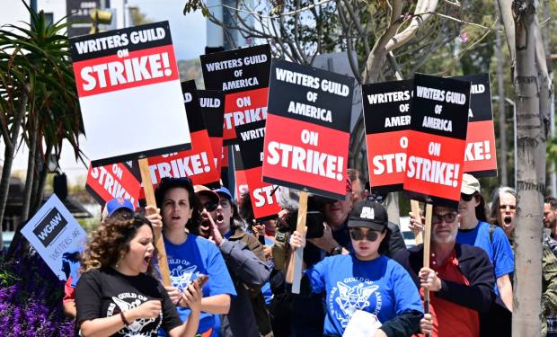 Writers picket in front of Netflix on Sunset Boulevard in Hollywood