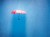 pink umbrella in a rain shower, conceptually photographed