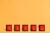 Five Rocker Switches On Orange Background