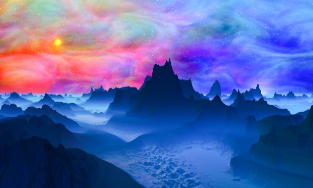 Colorful landscape with sky and mountains at twilight.